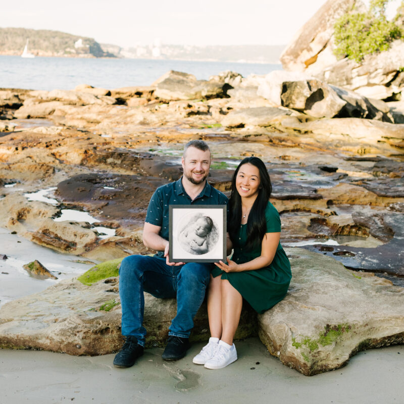 Parents Victoria and Danny Liston, hold a photo of their daughter Kiera