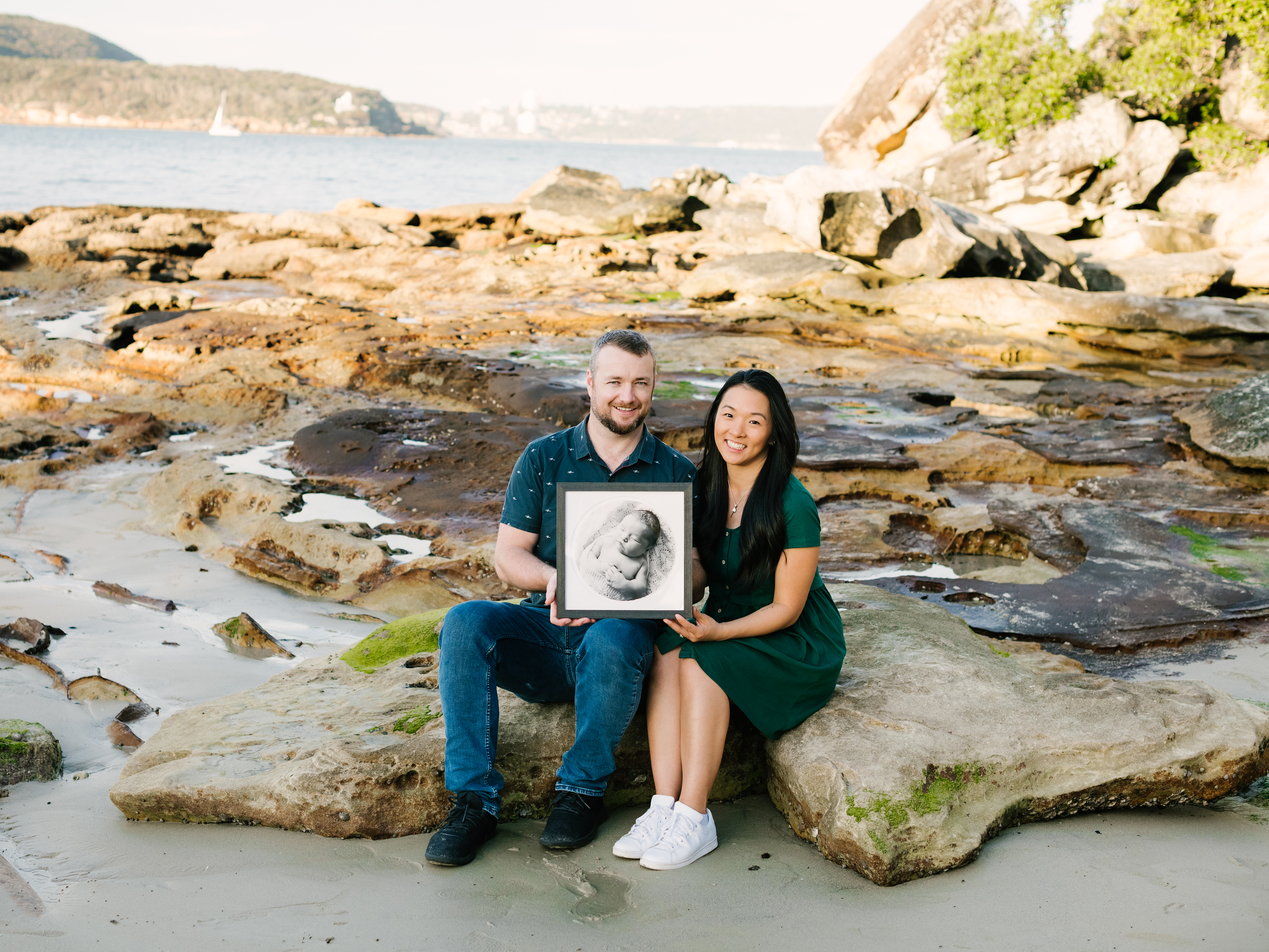 Parents Victoria and Danny Liston, hold a photo of their daughter Kiera