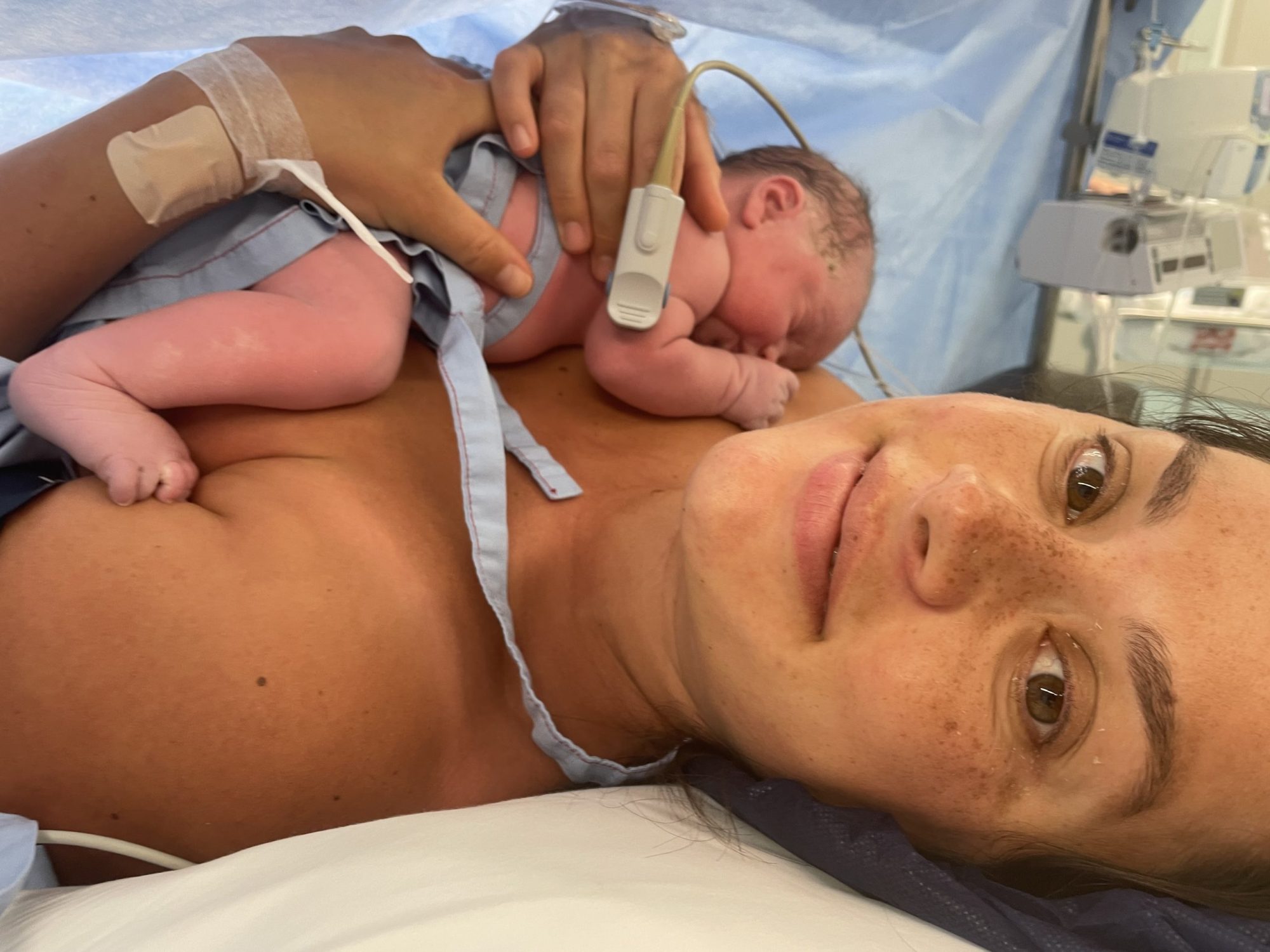 Mum holding her newborn