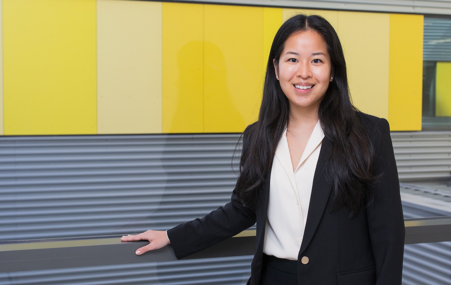 Woman of Asian ethnicity smiling