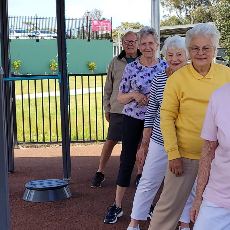 Four senior women and one senior men exercising