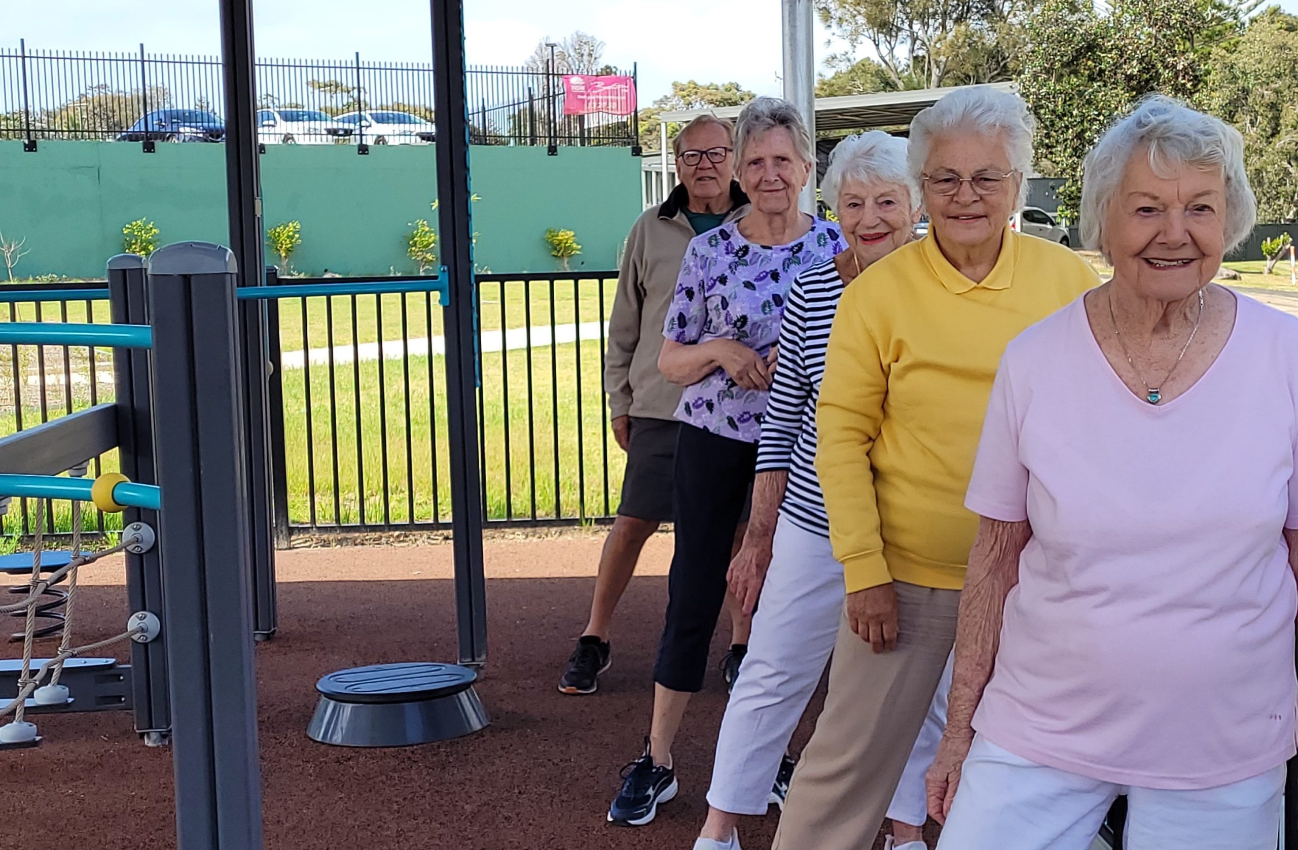 Four senior women and one senior men exercising